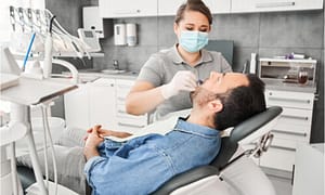 dentist taking impression 