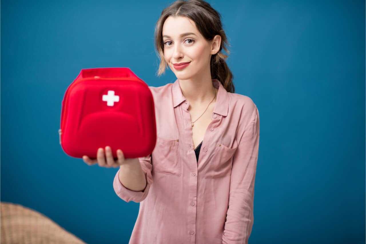 woman holding medical kit