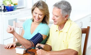 couple checking blood pressure